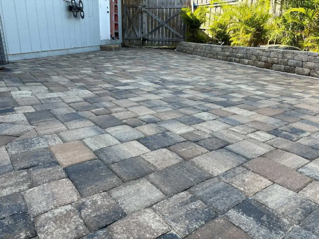 Sealed Pavers with brown and gray tones in them.