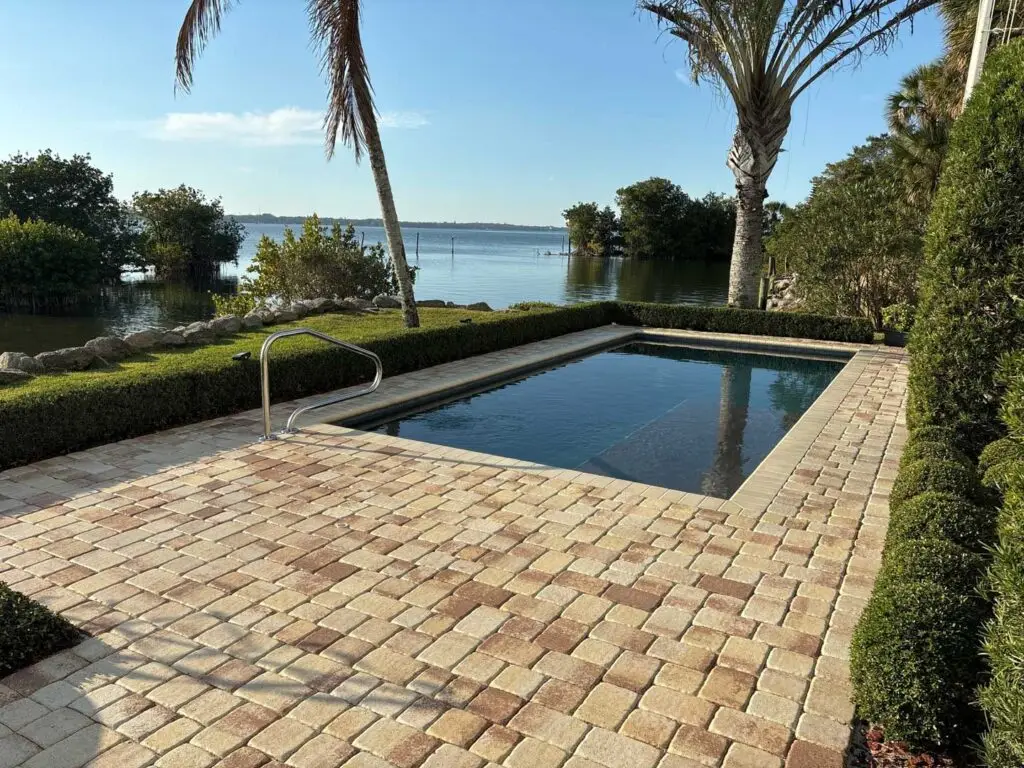 Sealed tan toned pavers.